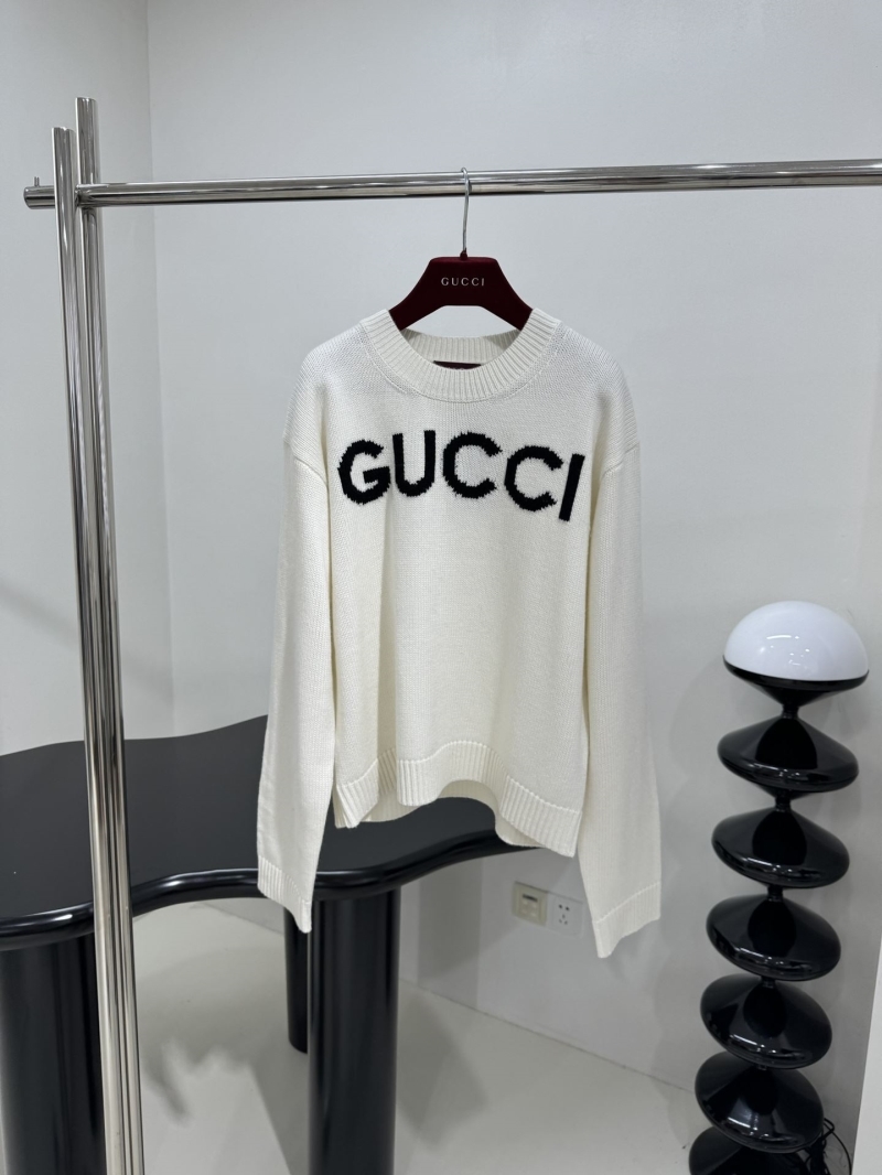 G*u*i sweaters